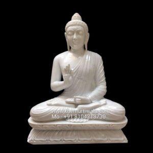 white marble statue of Buddha